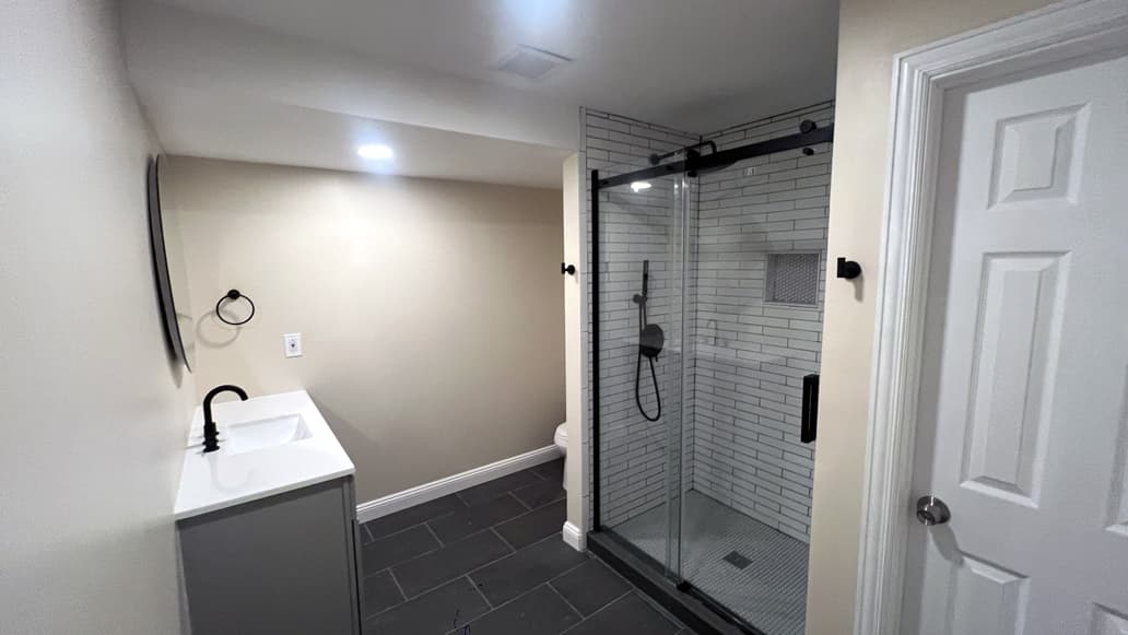 Center Moriches, NY 11934 - Basement bathroom at insurance displacement housing